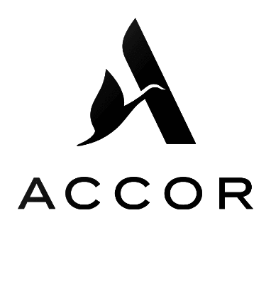 Black Accor logo featuring a stylized letter A with a bird motif on the left side, positioned above the word ACCOR in bold, modern font. Perfect for electric cars with free loading stations to charge; background is transparent.