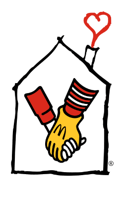 A white house with a red heart-shaped smoke coming from its chimney. Inside, a red and white striped arm and a yellow-gloved hand are shaking hands, celebrating free loading stations for electric cars.